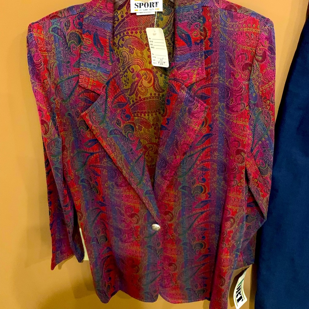 Beautiful 4 piece Sport Suit. Denim skirt, Jacket, Vest, Blouse. New With tags.